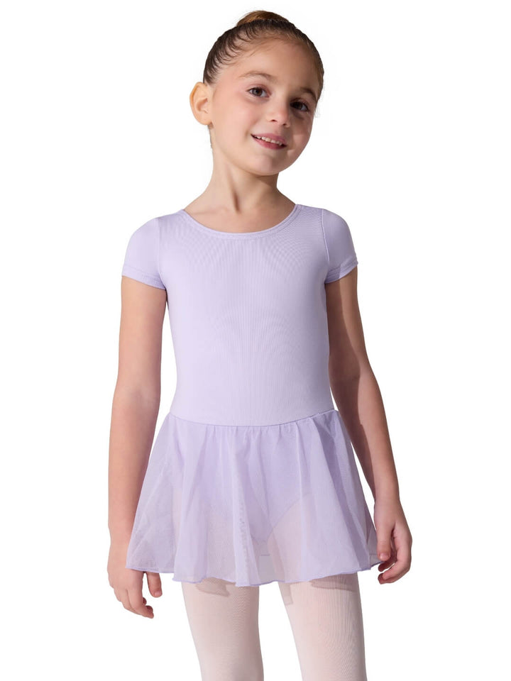 Young girl wearing a light purple dress on a white background
