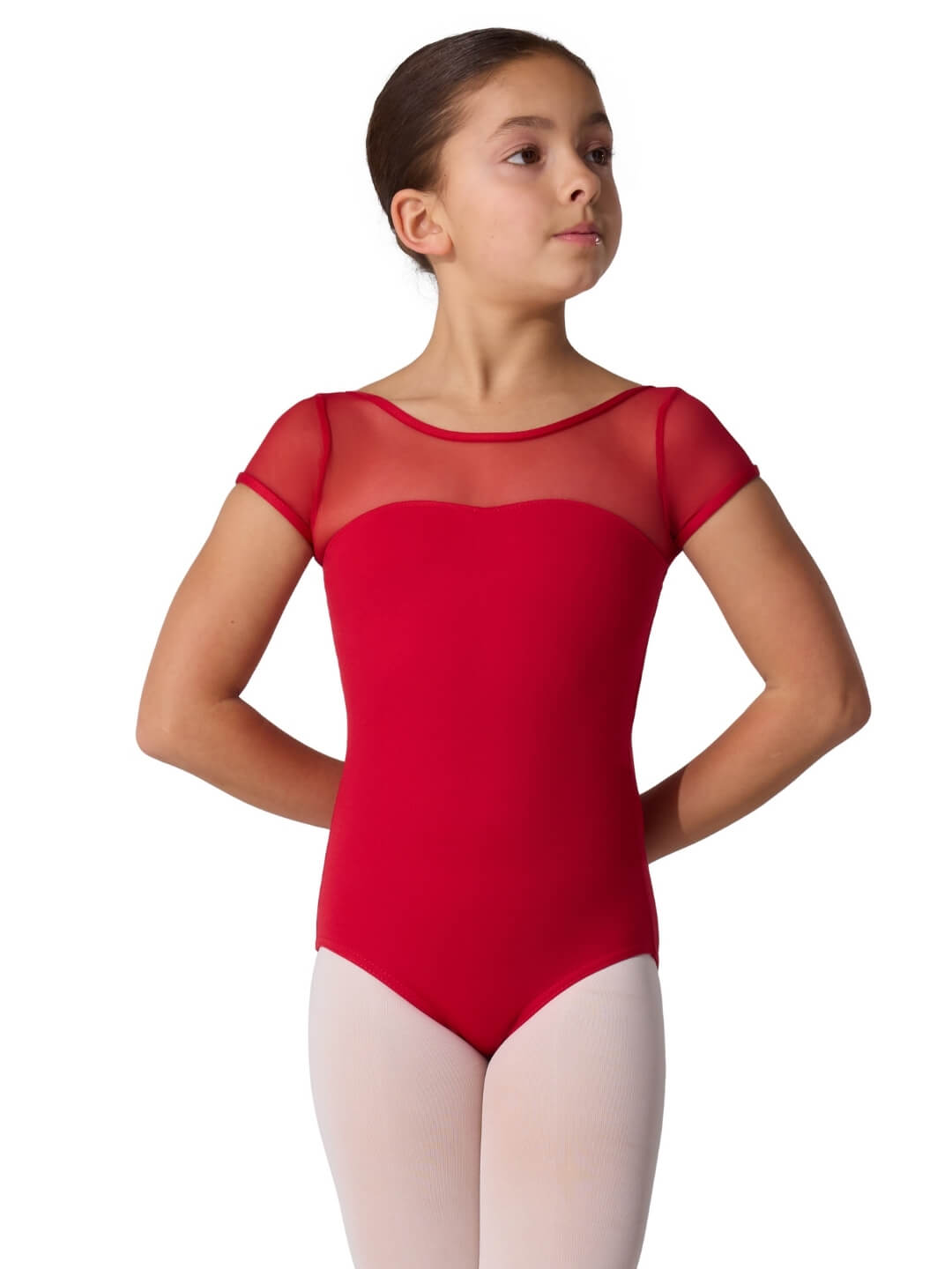 Young girl wearing a red ballet leotard on a white background