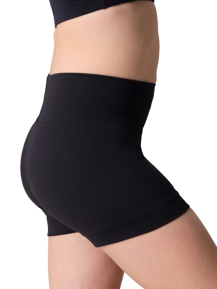 Black high-waisted shorts worn by a person on a white background