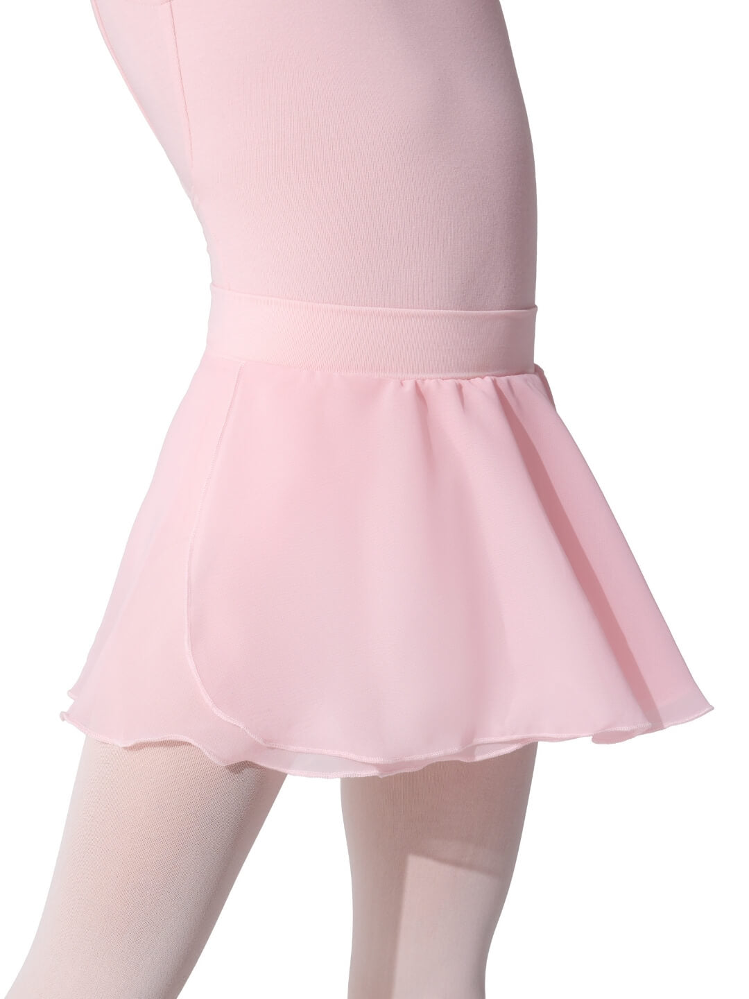 Pink skirt worn with white tights on a white background