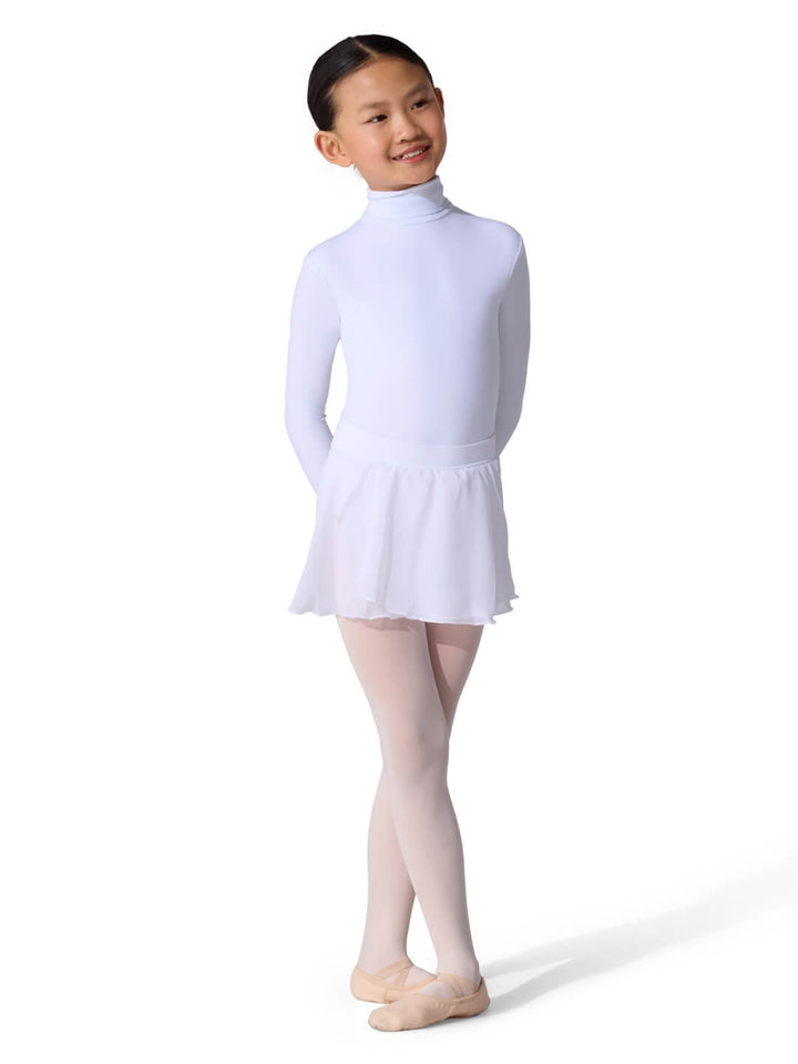 Young girl in a white dress and tights on a white background