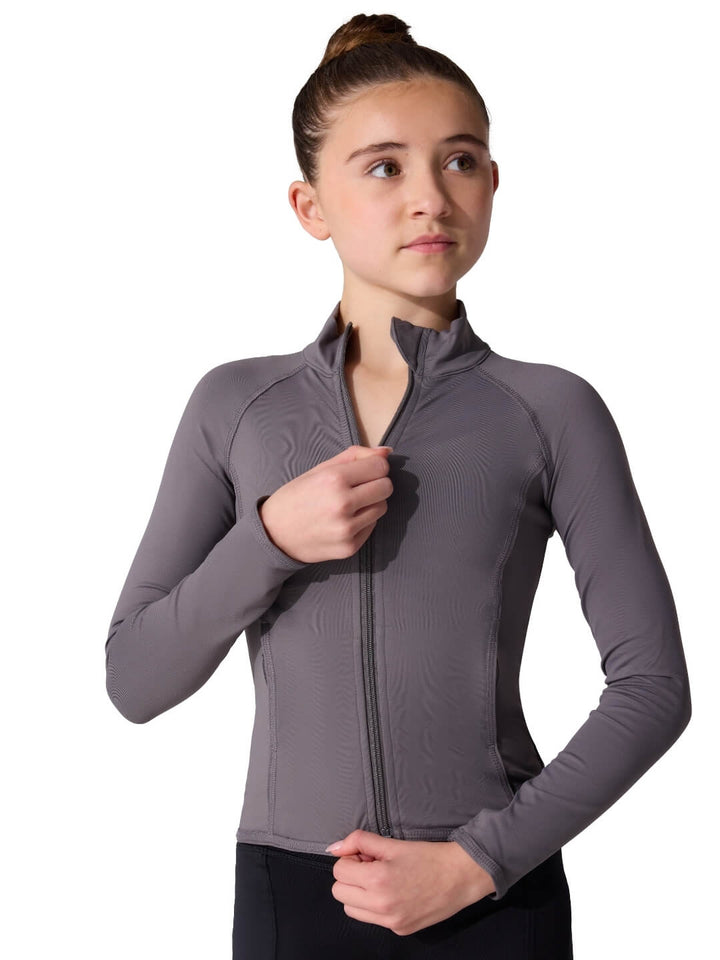 Woman wearing a gray athletic jacket on a white background
