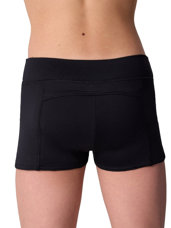 Black athletic shorts worn by a person on a white background