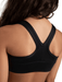 Black sports bra worn by a person on a white background