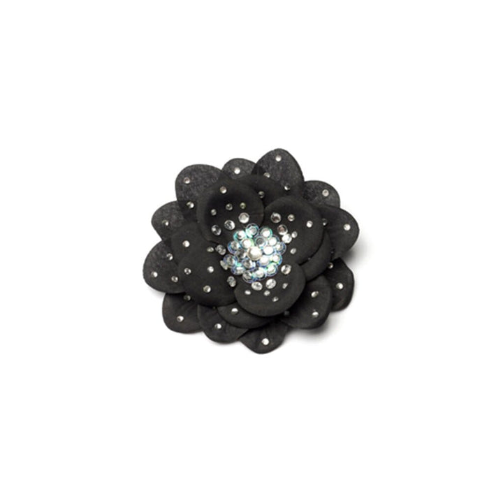 Black flower-shaped hair clip with rhinestones on a white background