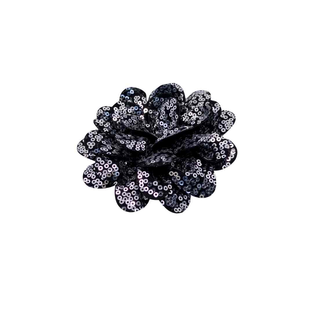 Black sequin flower hair clip on a white background