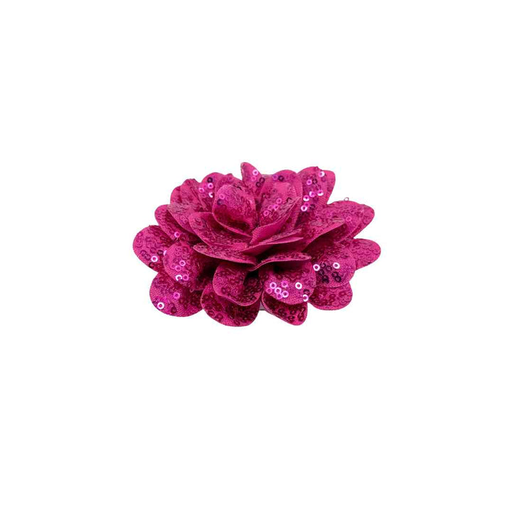 Pink sequin flower hair clip on a white background
