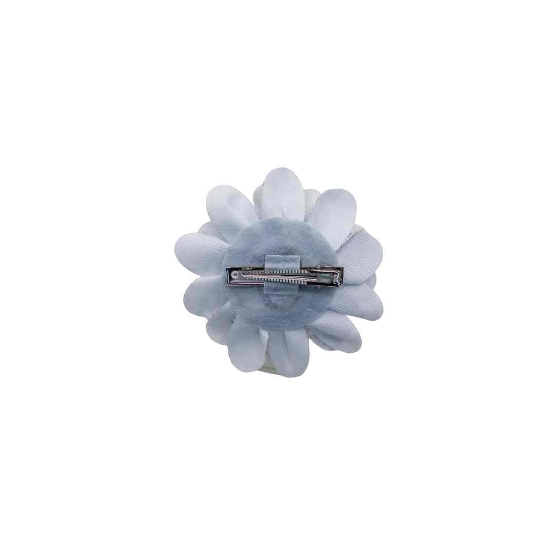 Floral hair clip with a barrette on a white background
