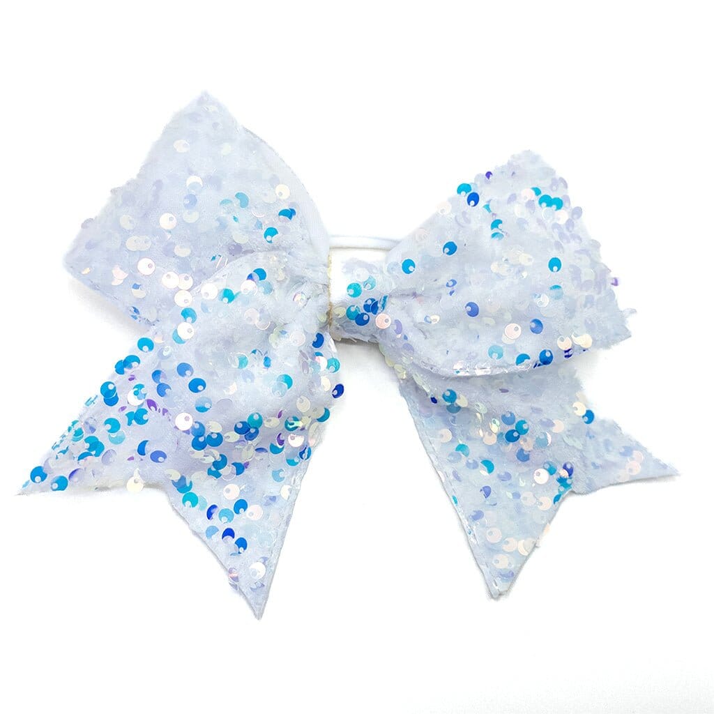 Large glittery blue and white bow on a white background