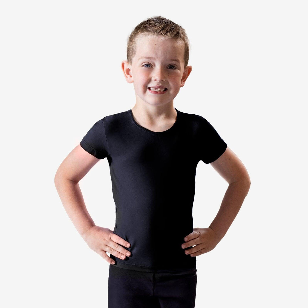 Young boy wearing a black t-shirt against a white background