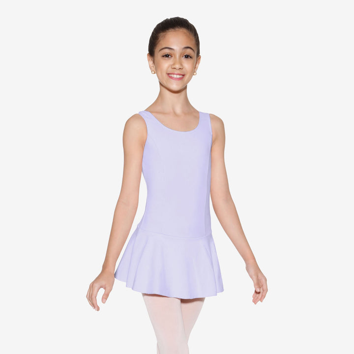 Young girl wearing a light purple sleeveless dress on a white background
