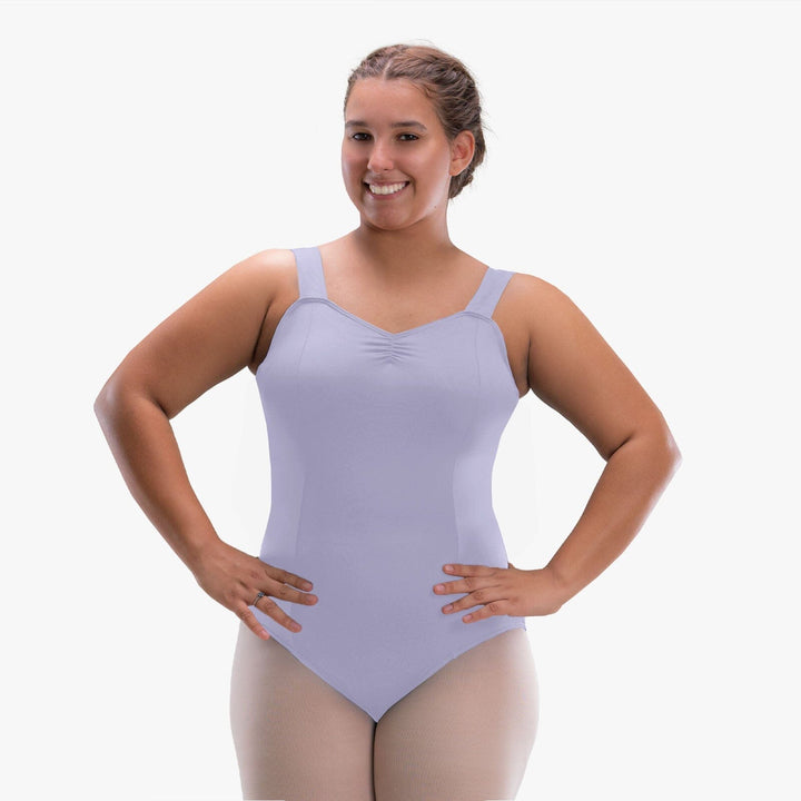 Woman wearing a light purple leotard on a white background