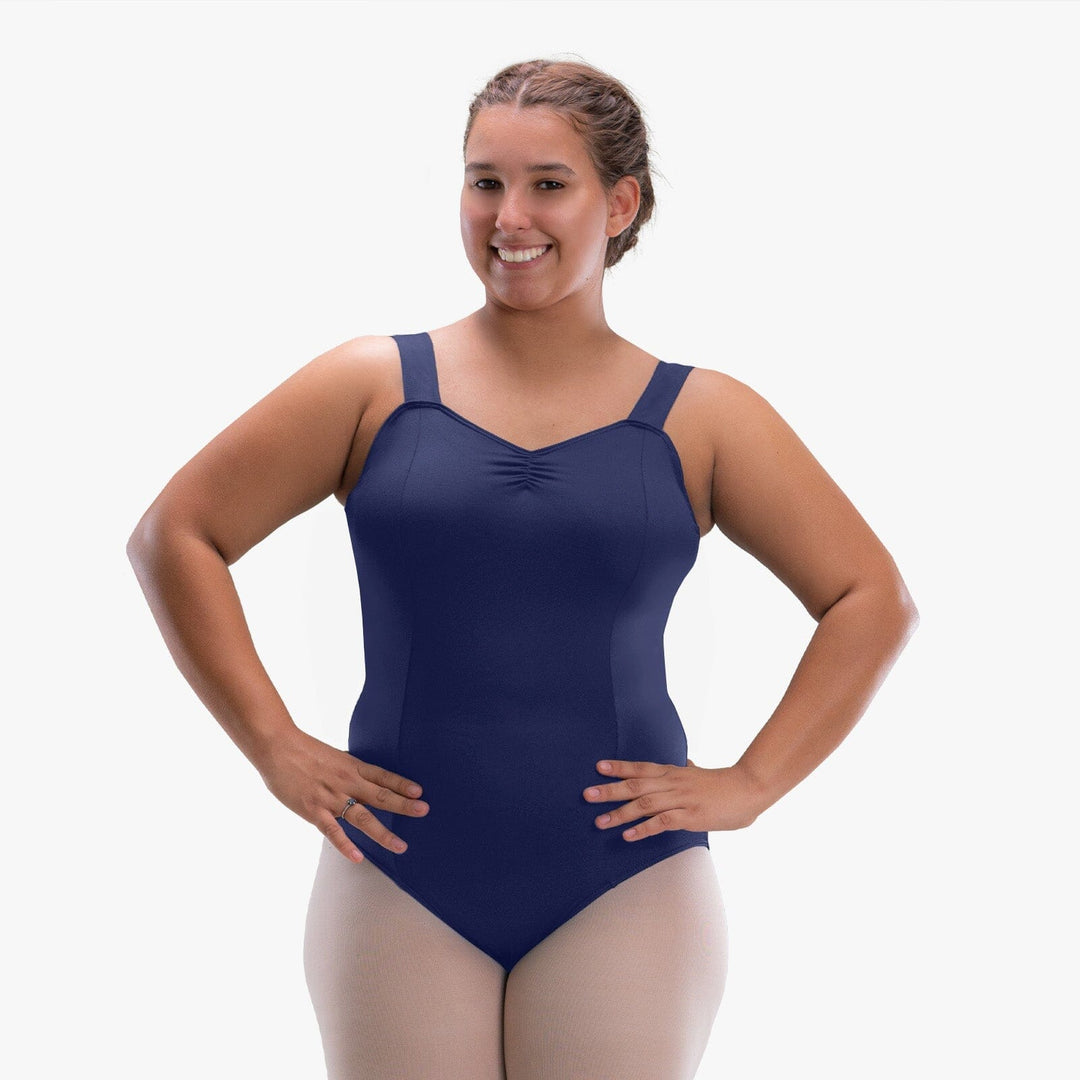 Woman wearing a navy blue swimsuit on a white background