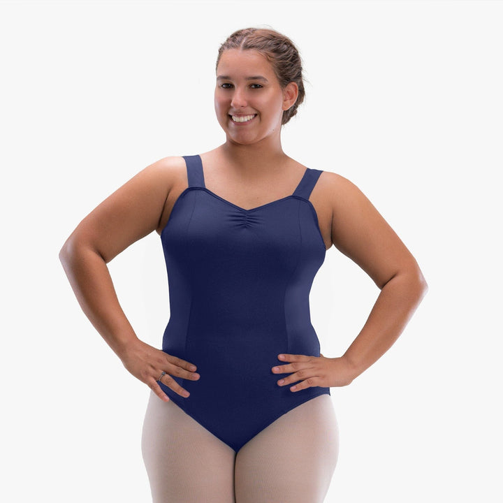 Woman wearing a navy blue swimsuit on a white background