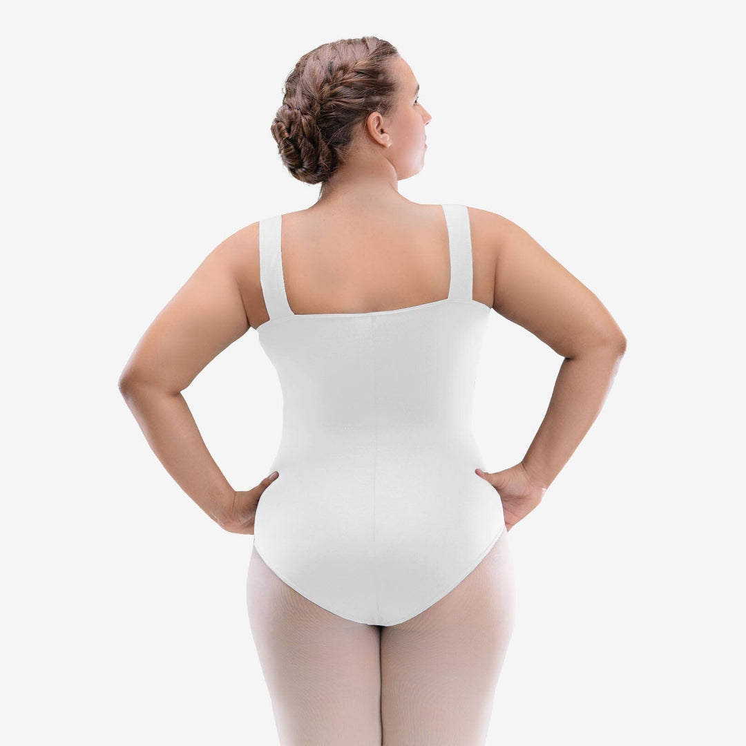 Person wearing a white bodysuit on a plain background