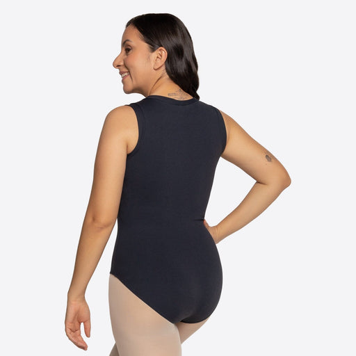 Woman wearing a black bodysuit on a white background
