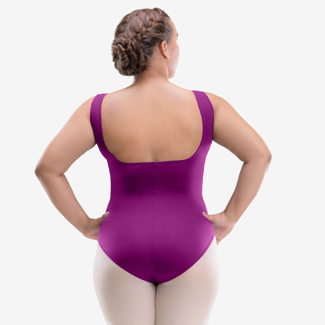 Person wearing a purple swimsuit on a white background