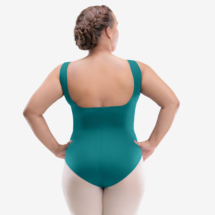 Person wearing a teal swimsuit on a white background