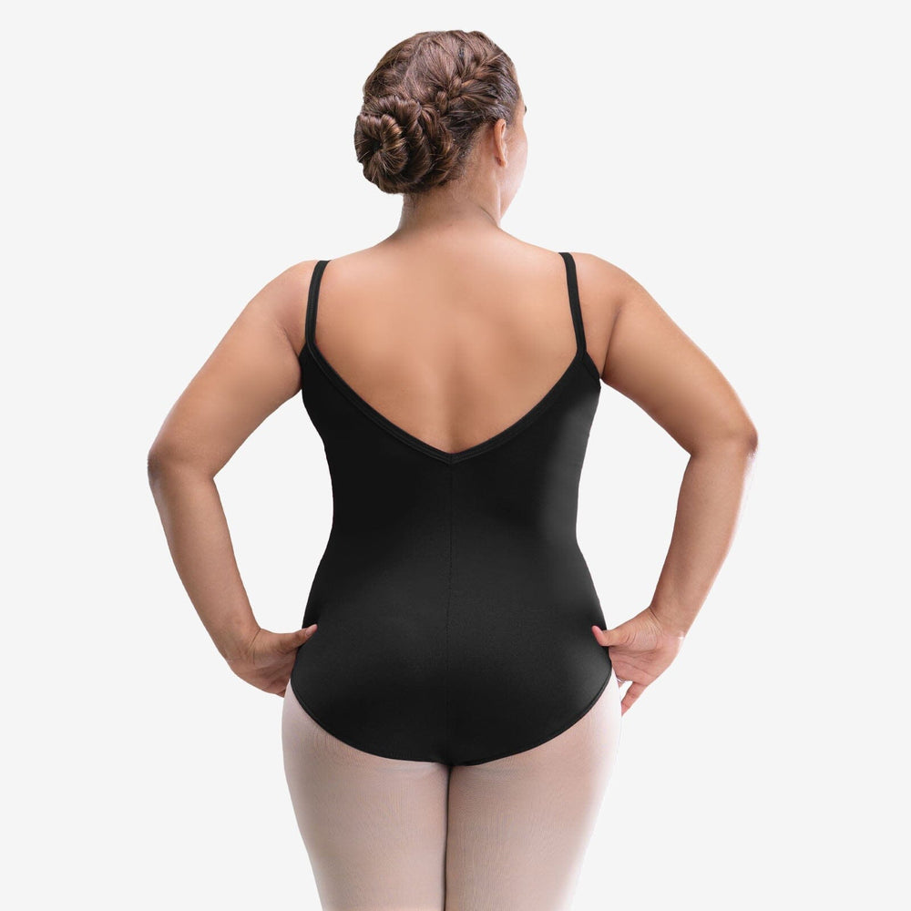 Person wearing a black leotard on a white background