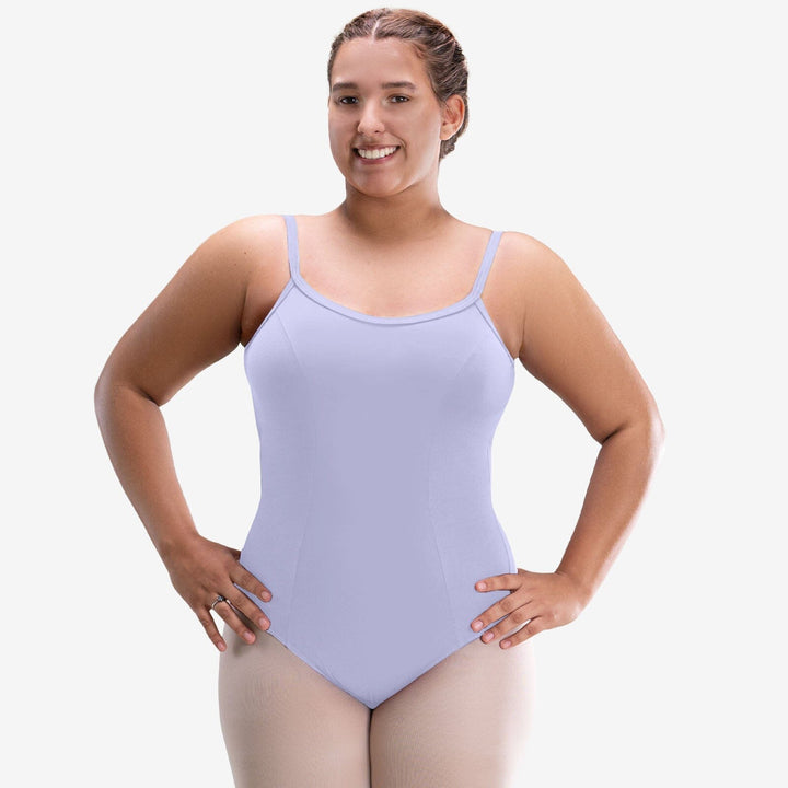 Woman wearing a light purple leotard on a white background