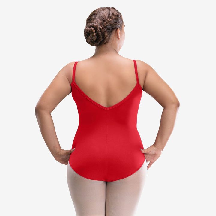 Person wearing a red leotard on a white background