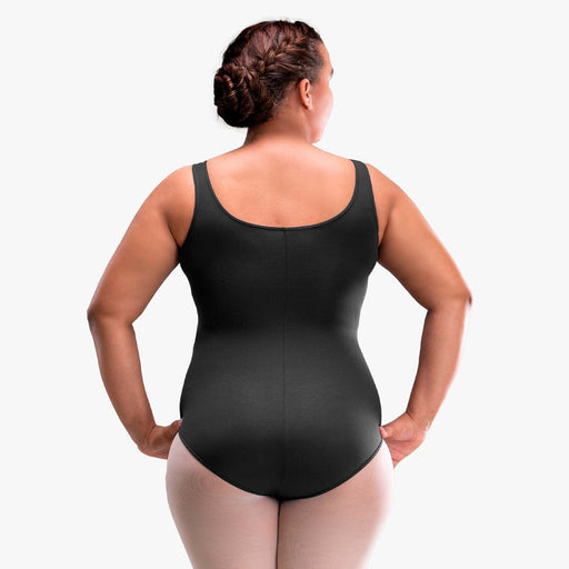 Person wearing a black bodysuit against a white background