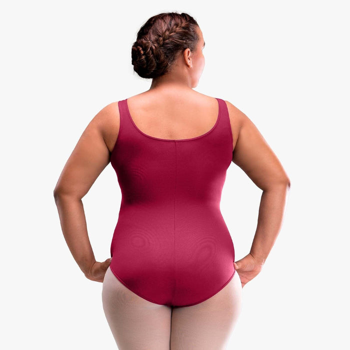 Person wearing a maroon bodysuit against a white background