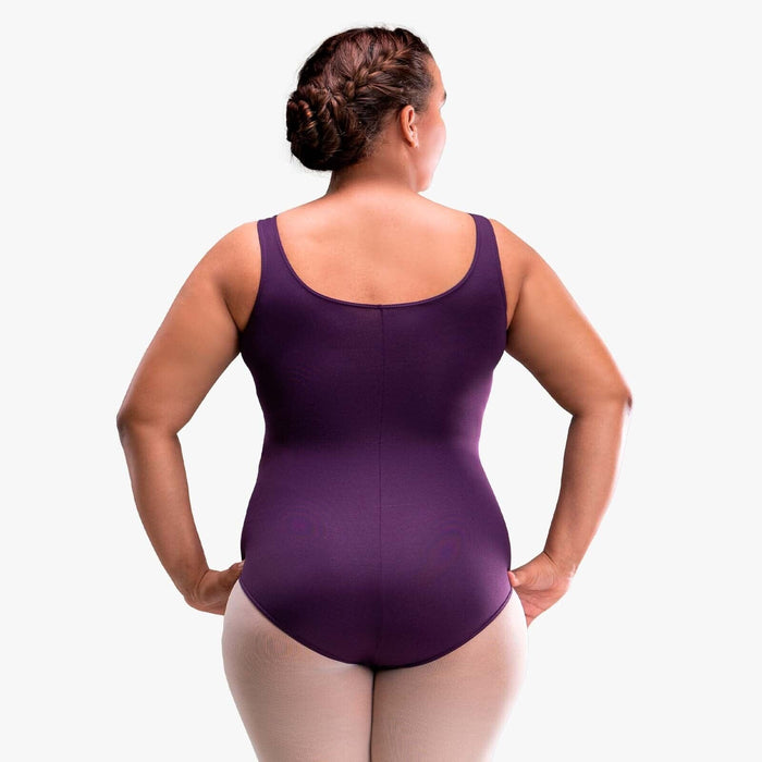 Person wearing a purple leotard on a white background