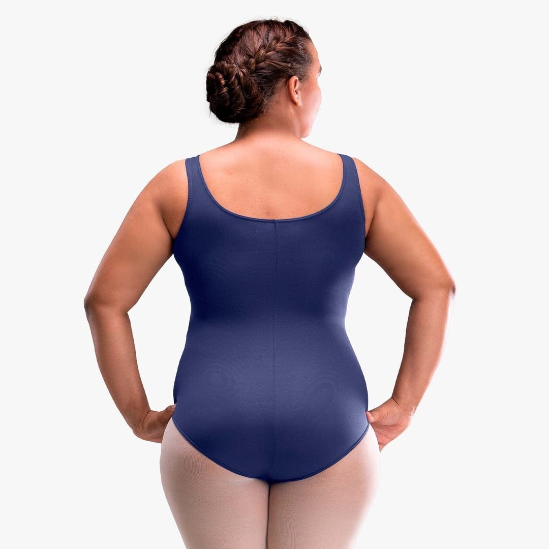 Person wearing a navy blue bodysuit on a white background