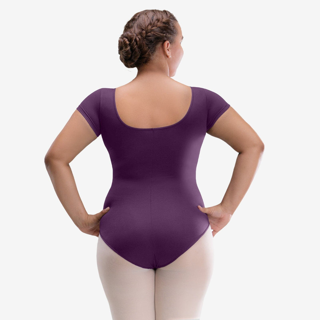 Person wearing a purple bodysuit on a white background