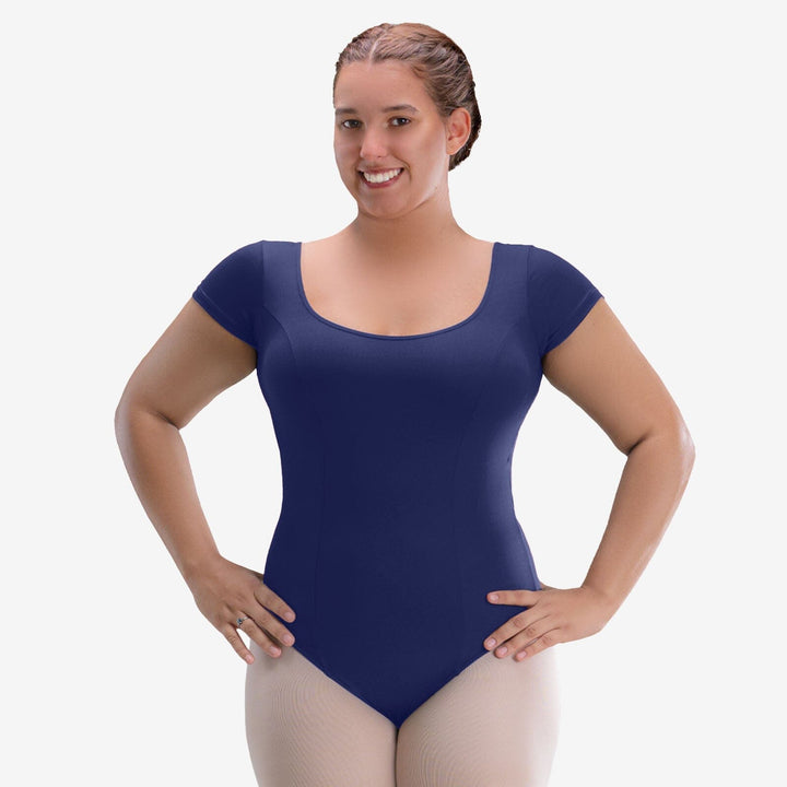 Woman wearing a blue leotard on a white background