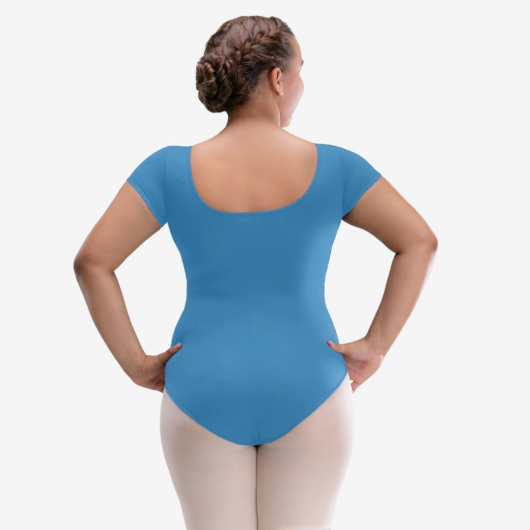 Person wearing a blue leotard on a white background