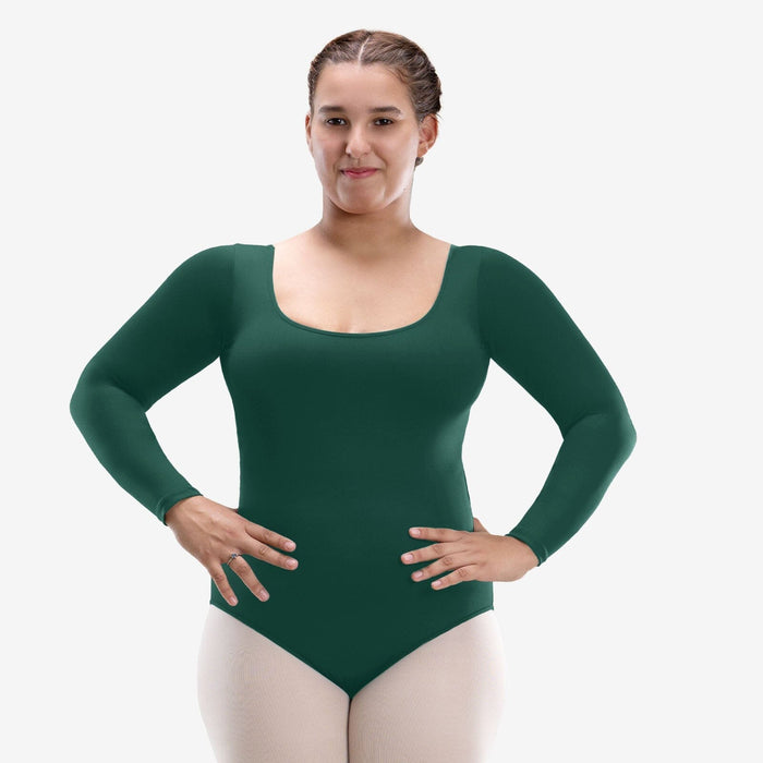 Woman wearing a green long-sleeve leotard on a white background