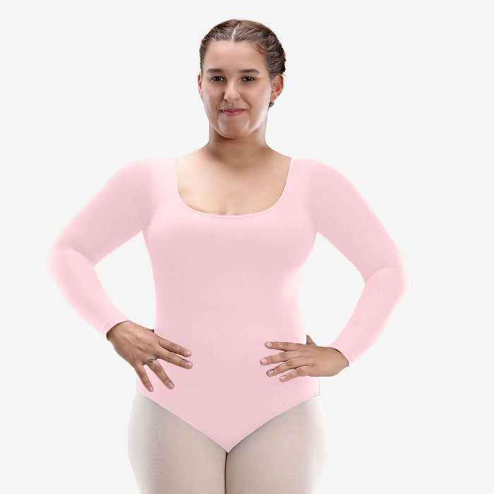 Person wearing a pink long-sleeve leotard on a white background