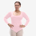 Person wearing a pink long-sleeve leotard on a white background