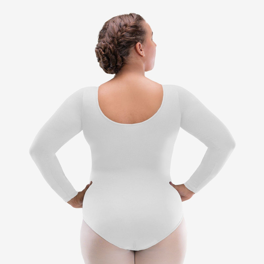 Person wearing a white long-sleeve bodysuit on a plain background