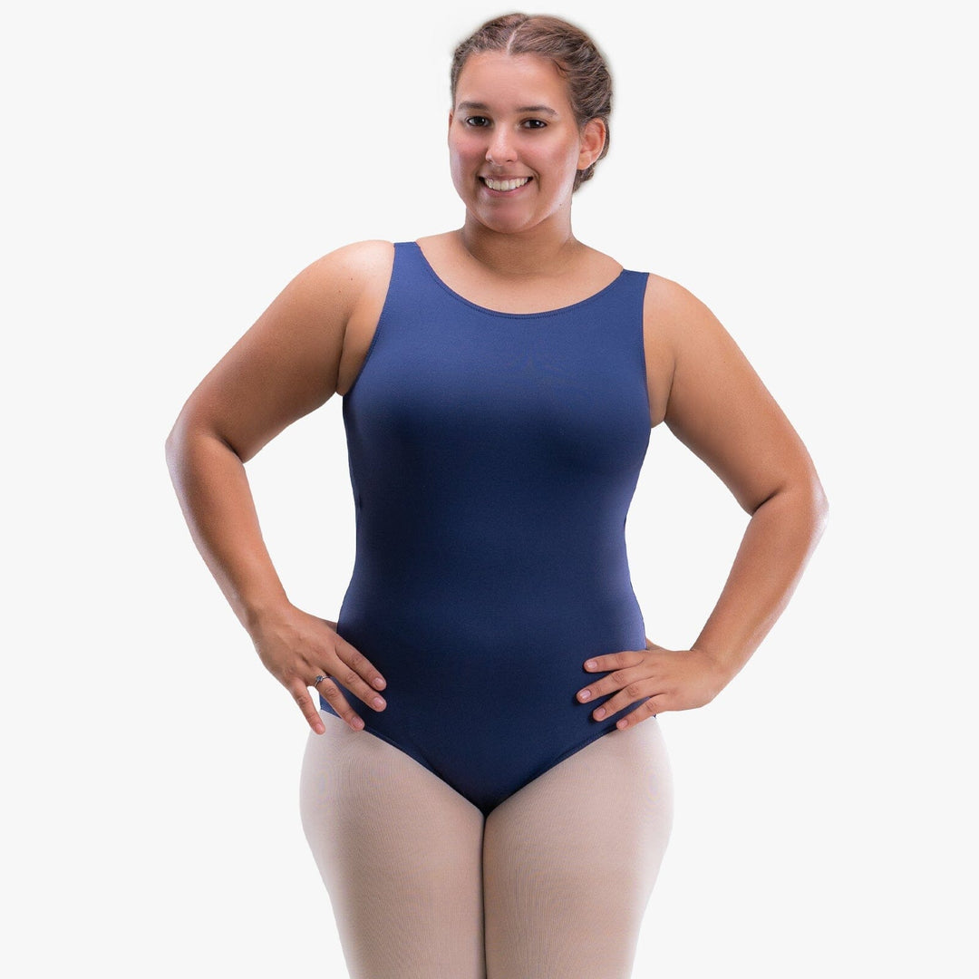 Woman wearing a navy blue swimsuit on a white background
