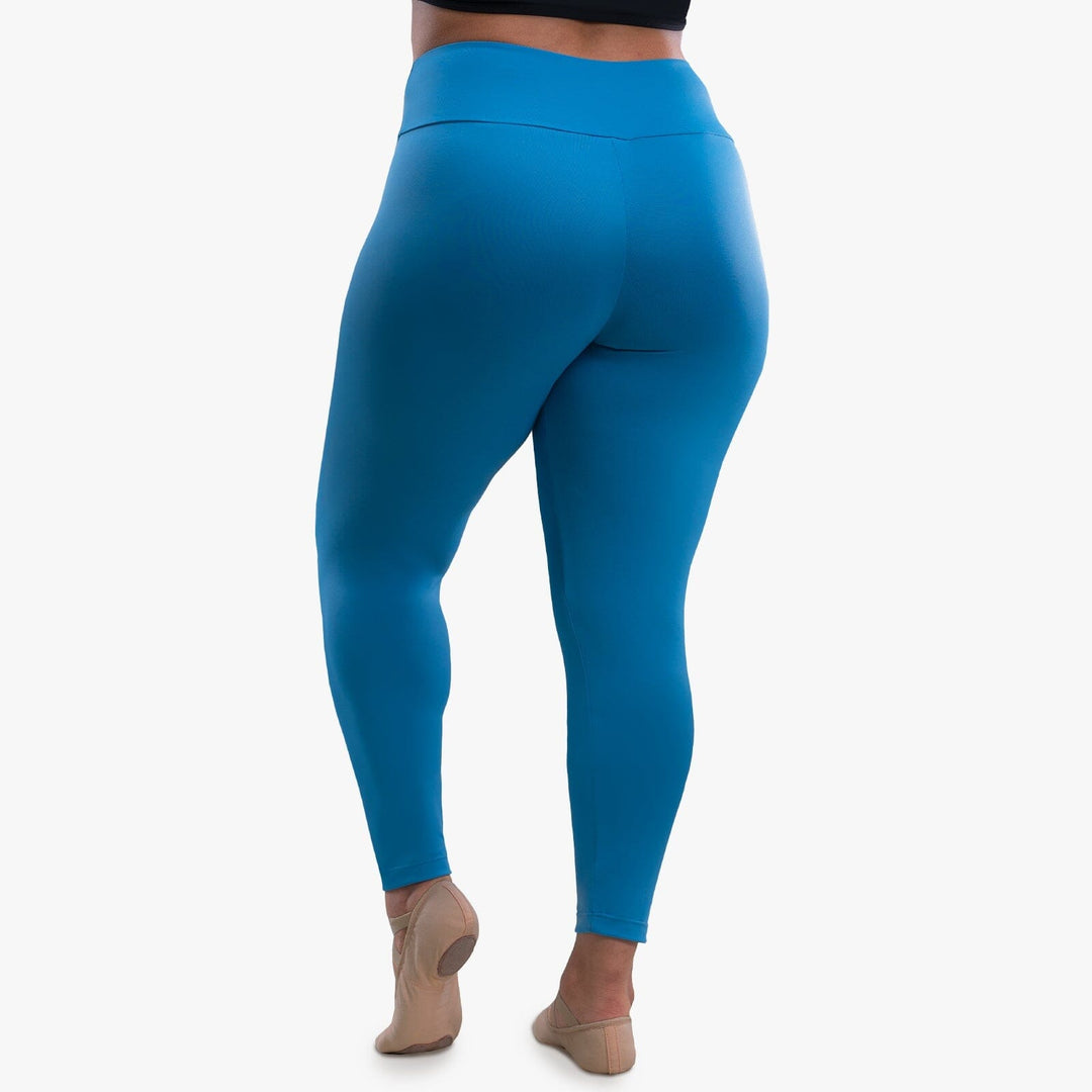 Blue leggings worn by a person on a white background
