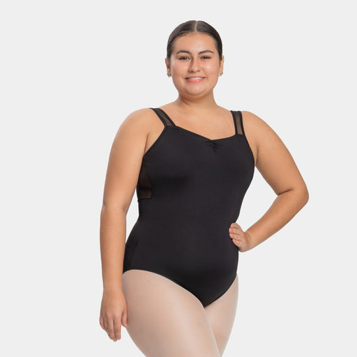 Woman wearing a black bodysuit on a white background