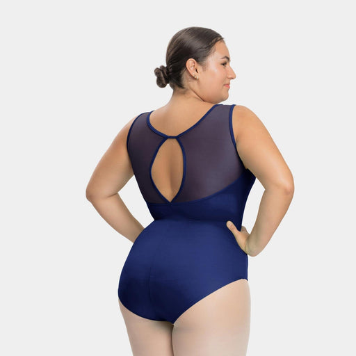 Woman wearing a navy blue swimsuit with cut-out design on a white background