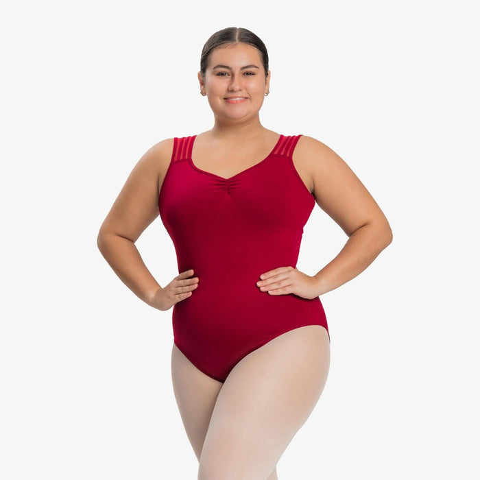 Woman wearing a red swimsuit on a white background