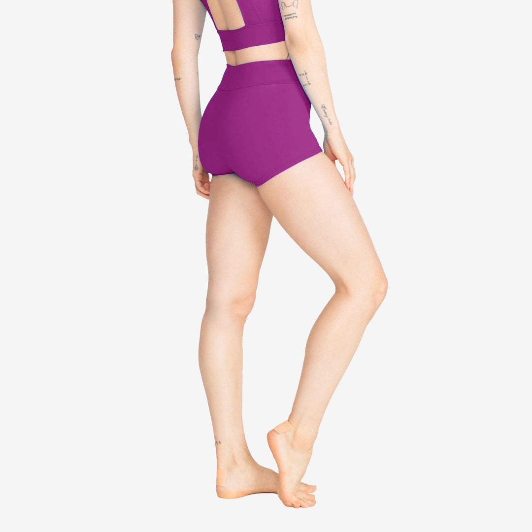 Person wearing a purple two-piece swimsuit on a white background