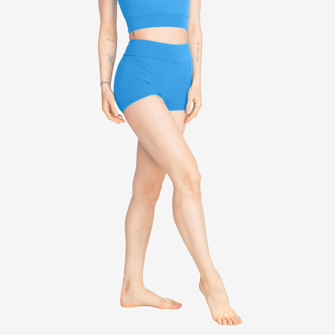 Person wearing a blue swimsuit on a white background