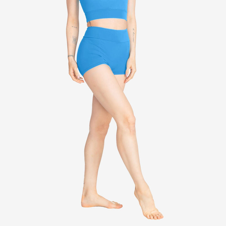 Person wearing a blue swimsuit on a white background