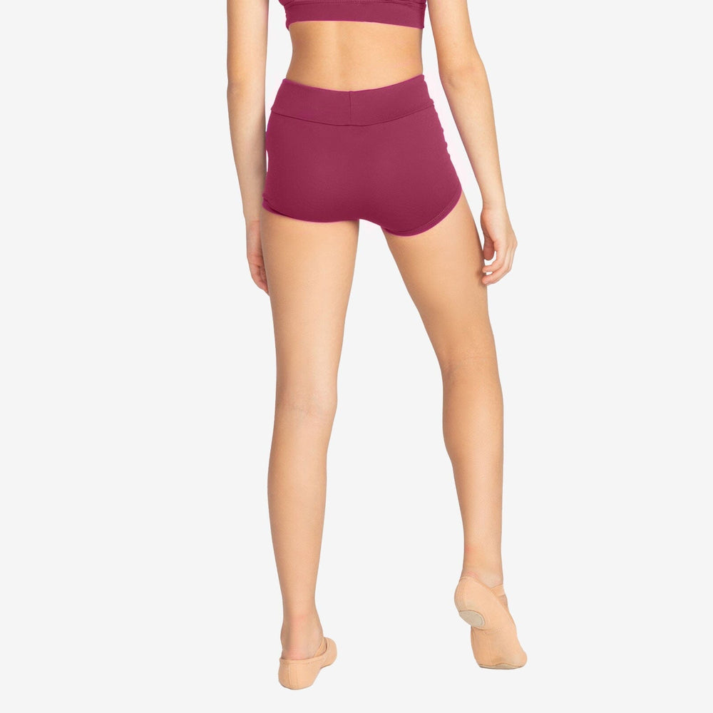 Person wearing maroon athletic shorts on a plain background