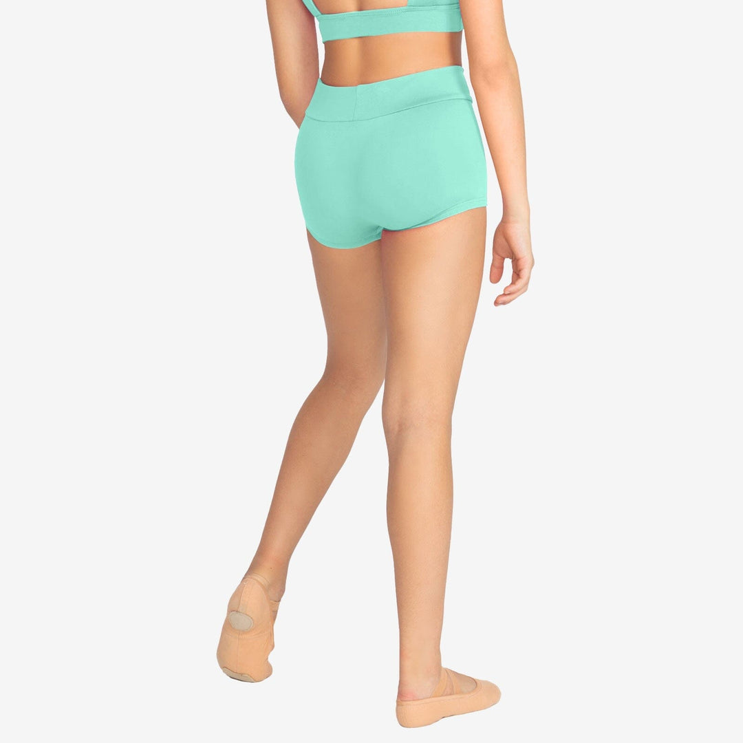 Person wearing teal high-waisted shorts and a matching top on a white background