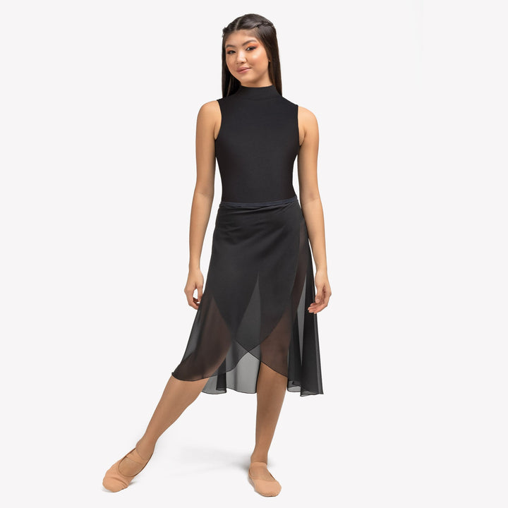 Woman wearing a black sleeveless top and sheer black skirt on a white background