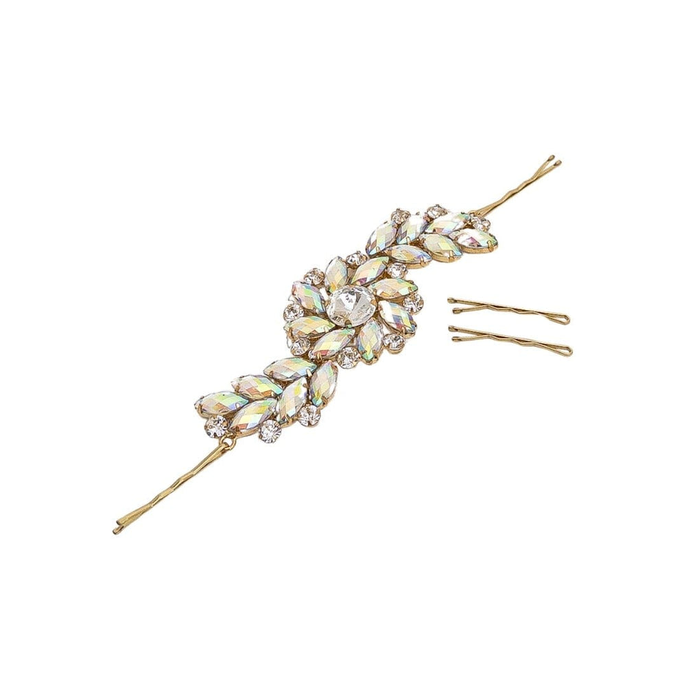 Decorative hairpin with crystals on a white background
