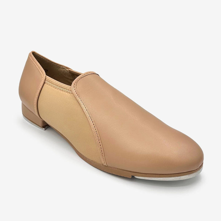 Tan slip-on shoe on a white background