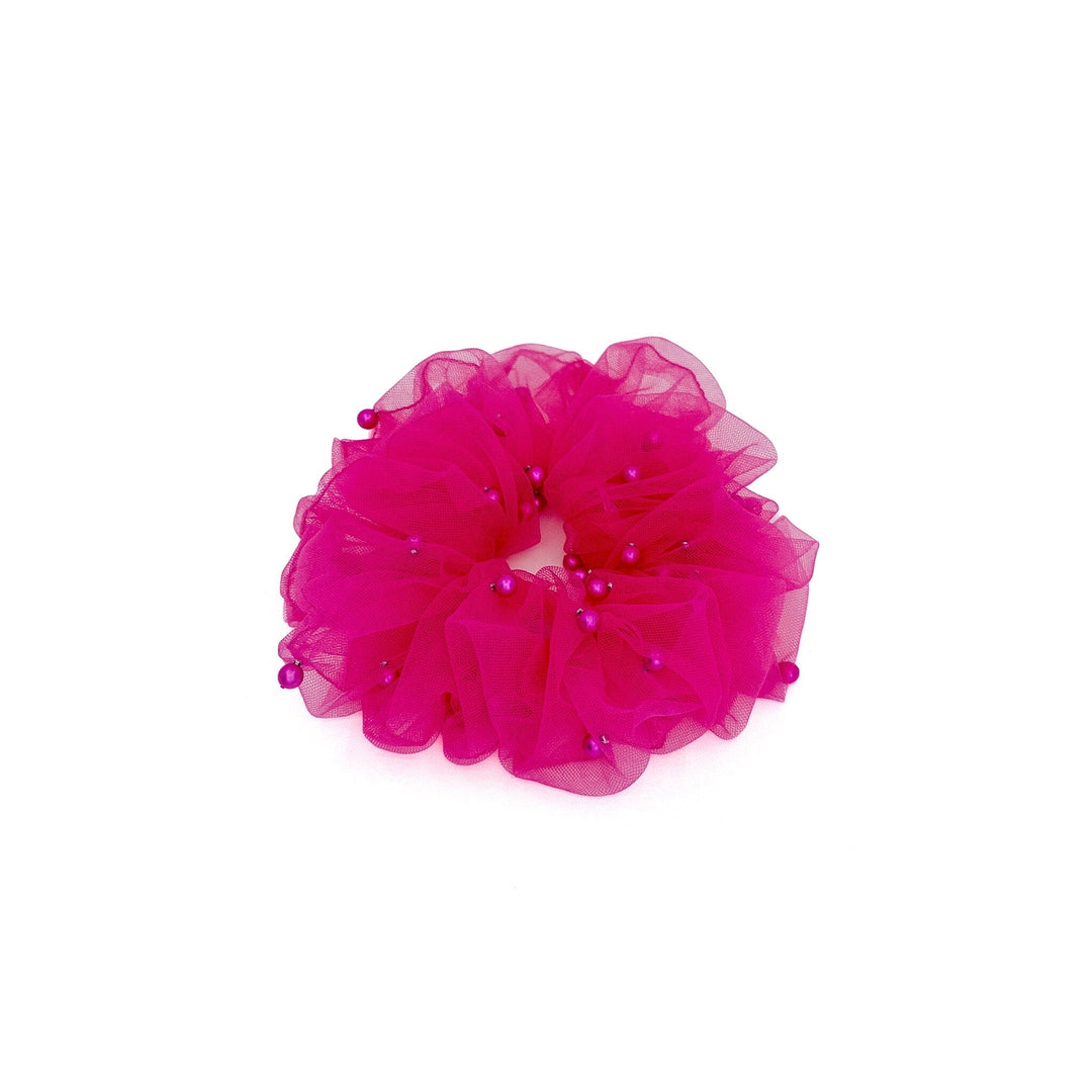 Pink tulle scrunchie with beads on a white background
